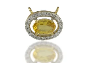 Gelber Saphir 0,52ct. in goldener Fassung