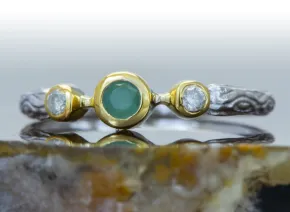 Ring mit Smaragd und Diamanten