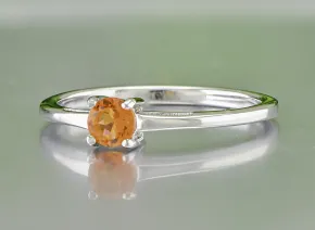 Eleganter Ring mit Orangefarbenem Saphir